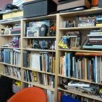 The shelves in the testing room are loaded with books, statues and many other inspirational items to keep the creative juices flowing. Tim Schafer keeps his collection of floaty pens here, as well.